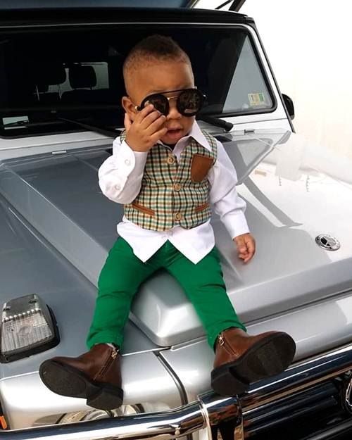Rev Obofour Junior Swags Up in Style on Father G-Wagon
