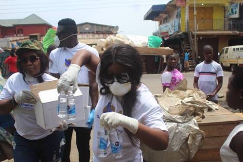 Ohemaa Mercy Gifts Hand Sanitizers To Market Women