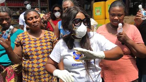 Ohemaa Mercy Gifts Hand Sanitizers To Market Women